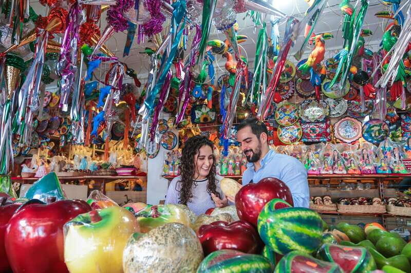 Couple exploring street market